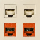 White ports and orange port plug-ins.